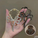 Hårspenne med sløyfe