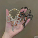 Hårspenne med sløyfe