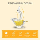 Manuell gjennomsiktig juicer i form av en liten fugl